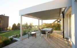 Comment fixer une pergola au sol ?